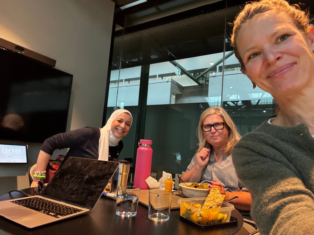 Unibloom team members over a working lunch in the office